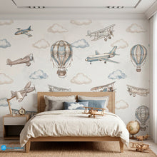 Load image into Gallery viewer, Vintage aviation kids wallpaper with watercolor airplanes, hot air balloons, and soft clouds in beige and dusty blue colors.