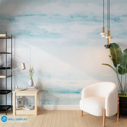 Abstract clouds wall mural in soft blue watercolor style for bedroom, nursery, and kids room wallpaper.