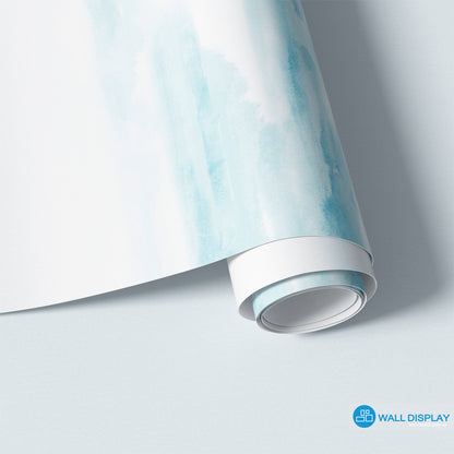 Abstract clouds wall mural in soft blue watercolor style for bedroom, nursery, and kids room wallpaper.