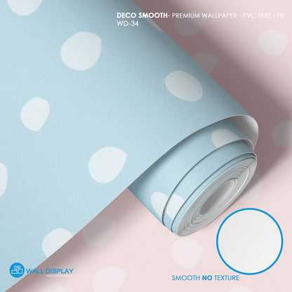Soft Pebble Dots kids wallpaper with white hand-painted pebble dots on a pastel blue background for nursery and playroom walls.