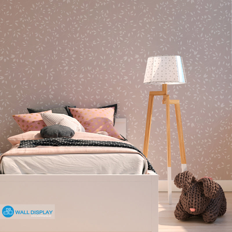 Soft Petals floral wallpaper with white leafy branches on a dusty pink background for girls’ bedroom, nursery, and kids’ room walls.
