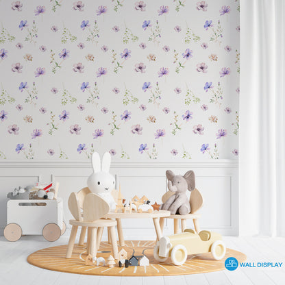 Soft spring floral wallpaper with delicate watercolor purple and blush flowers on a white background for nursery, girls’ room, kids’ room, and bedroom walls.