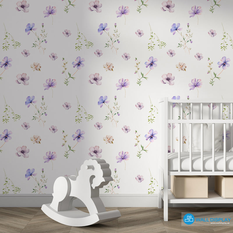 Soft spring floral wallpaper with delicate watercolor purple and blush flowers on a white background for nursery, girls’ room, kids’ room, and bedroom walls.