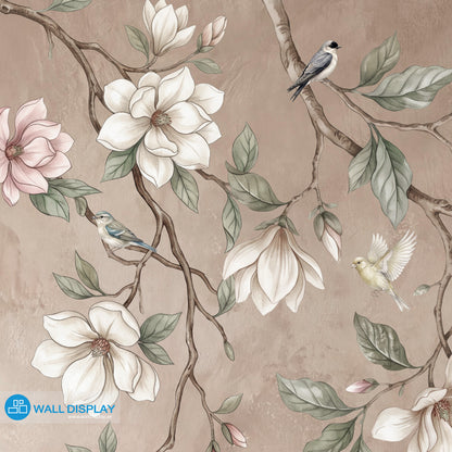 Songbirds in Bloom floral wall mural with magnolia blossoms, flying birds, sage green leaves, and soft blush plaster background.