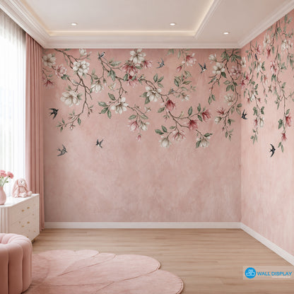 Songbirds in Bloom floral wall mural with magnolia blossoms, flying birds, sage green leaves, and soft blush plaster background.
