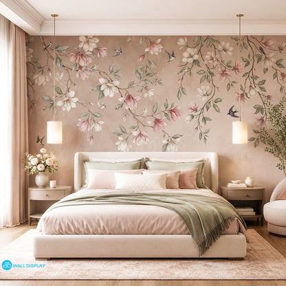 Songbirds in Bloom floral wall mural with magnolia blossoms, flying birds, sage green leaves, and soft blush plaster background.