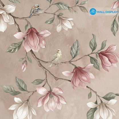 Songbirds in Bloom floral wall mural with magnolia blossoms, flying birds, sage green leaves, and soft blush plaster background.
