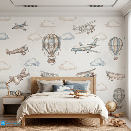 Vintage aviation kids wallpaper with watercolor airplanes, hot air balloons, and soft clouds in beige and dusty blue colors.