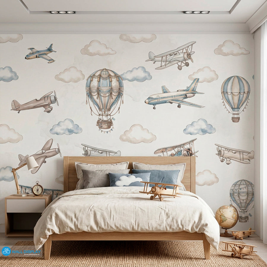 Vintage aviation kids wallpaper with watercolor airplanes, hot air balloons, and soft clouds in beige and dusty blue colors.