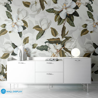 Whispering Magnolia Petals floral wallpaper with white magnolia flowers, green leaves, and light or dark background options for bathroom, bedroom, and feature walls.