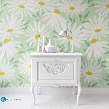 Daisy floral wallpaper with large white flowers, yellow centers, and pastel green background for bedrooms, nurseries, girls’ rooms, and modern feature walls.