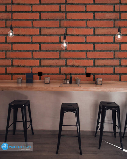 Red brick wall pattern wallpaper with realistic textured bricks and dark mortar lines for industrial interiors, cafés, offices, and feature walls.