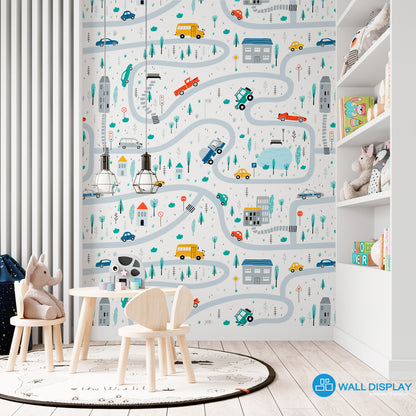 Vroom Zoom kids wallpaper with illustrated roads, cars, buses, trucks, houses, trees, and traffic signs for nursery, playroom, and children’s room walls.