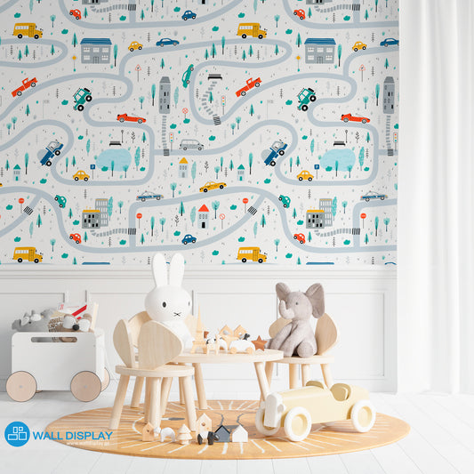 Vroom Zoom kids wallpaper with illustrated roads, cars, buses, trucks, houses, trees, and traffic signs for nursery, playroom, and children’s room walls.