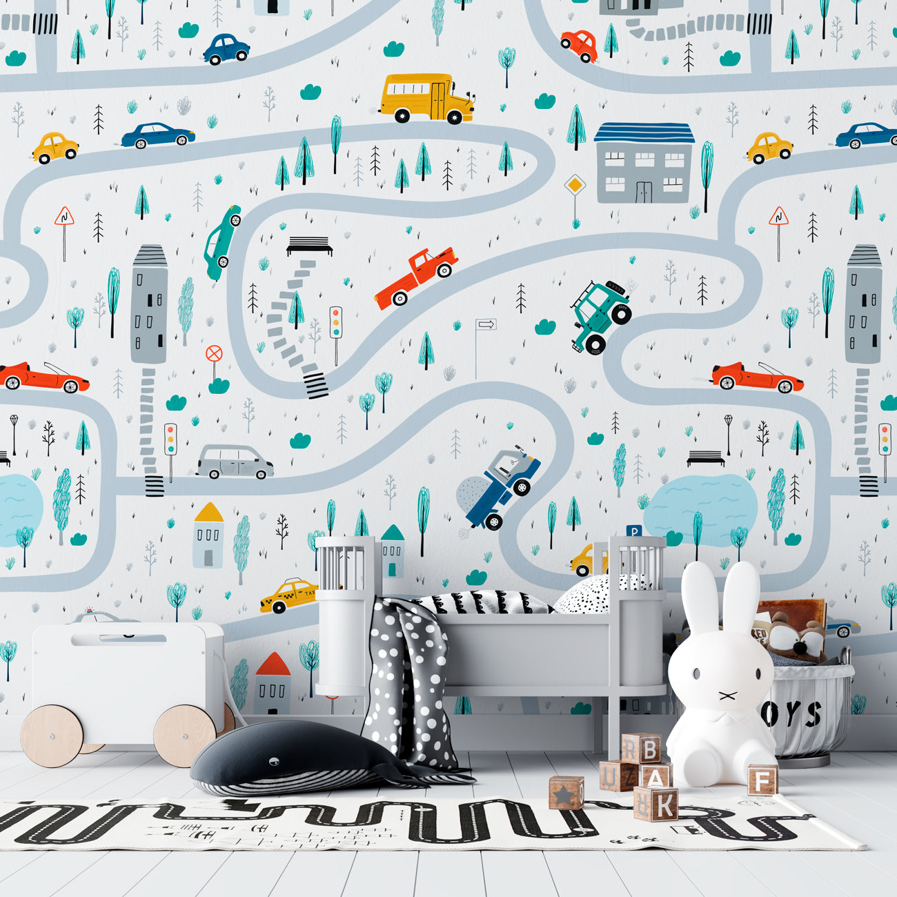 Vroom Zoom kids wallpaper with illustrated roads, cars, buses, trucks, houses, trees, and traffic signs for nursery, playroom, and children’s room walls.